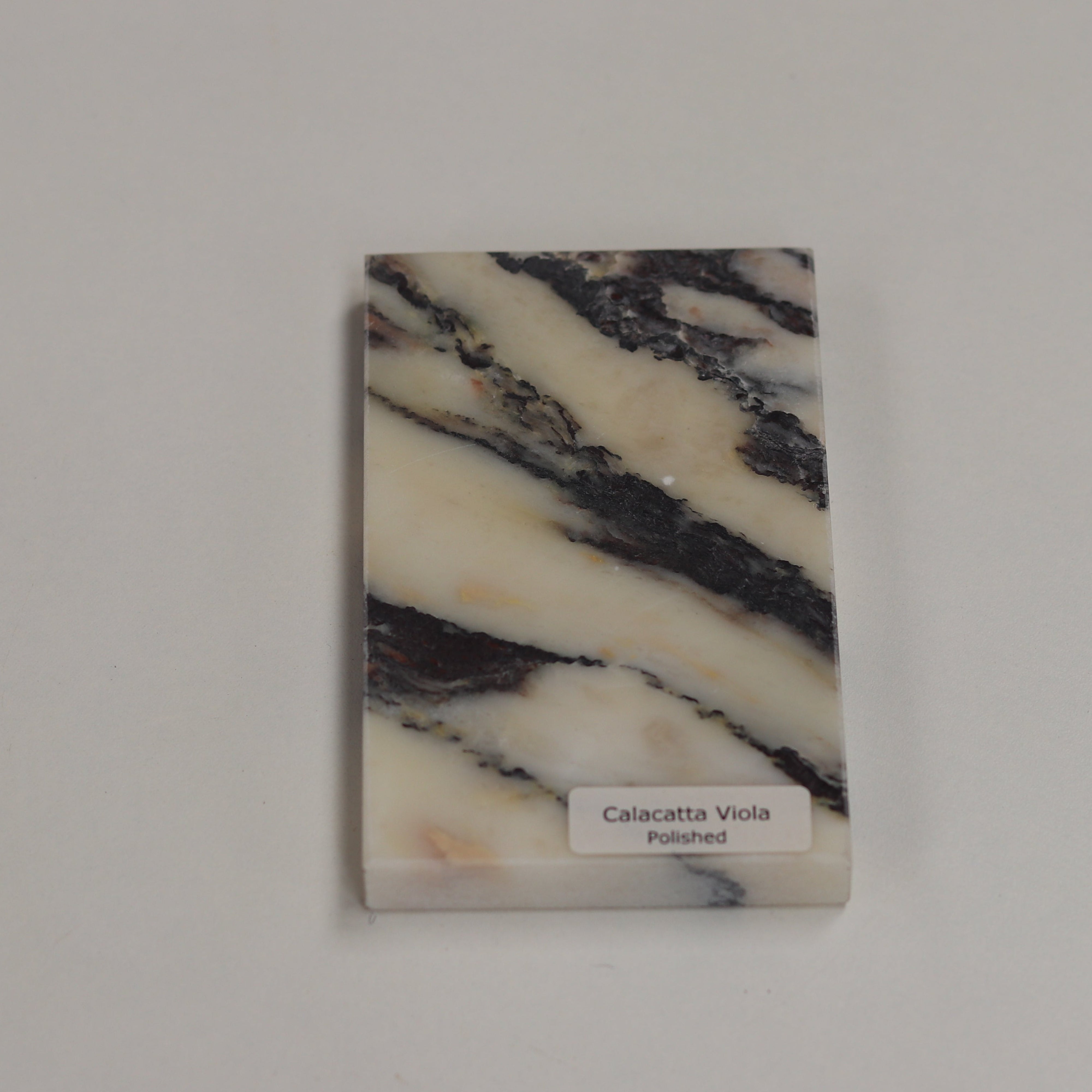 In its polished finish, Calacatta Viola becomes truly striking — the high‑gloss surface intensifies the marble’s deep violet veining and warm undertones, creating a bold, expressive focal point.
