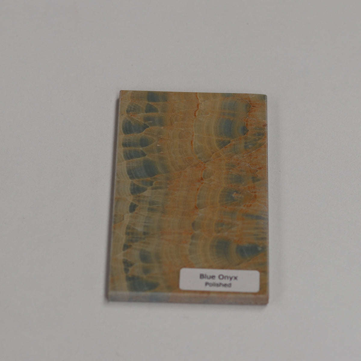 Polished Blue Onyx — high‑gloss surface with luminous depth