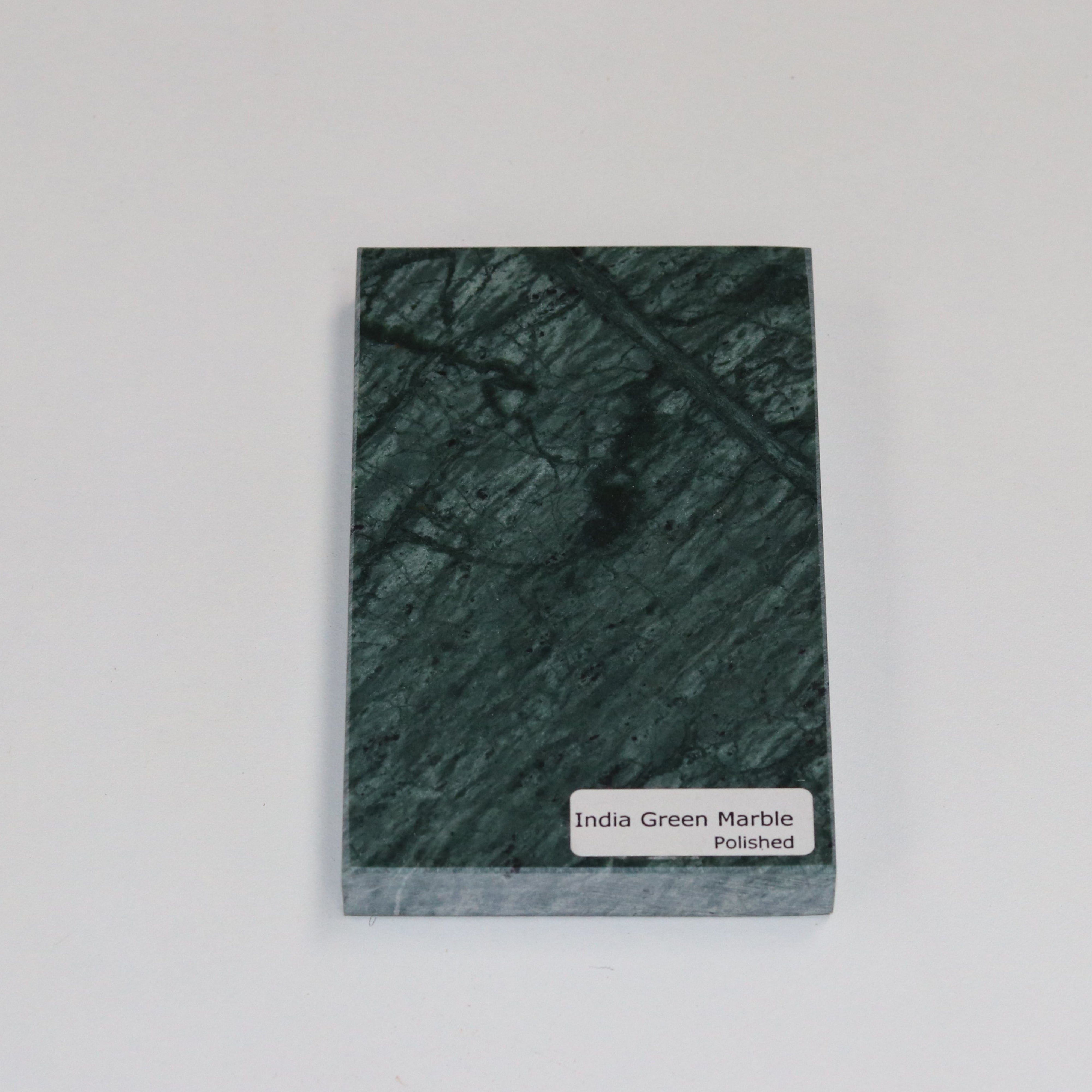 Polished Indian Green — high‑gloss surface with deep forest‑green tones