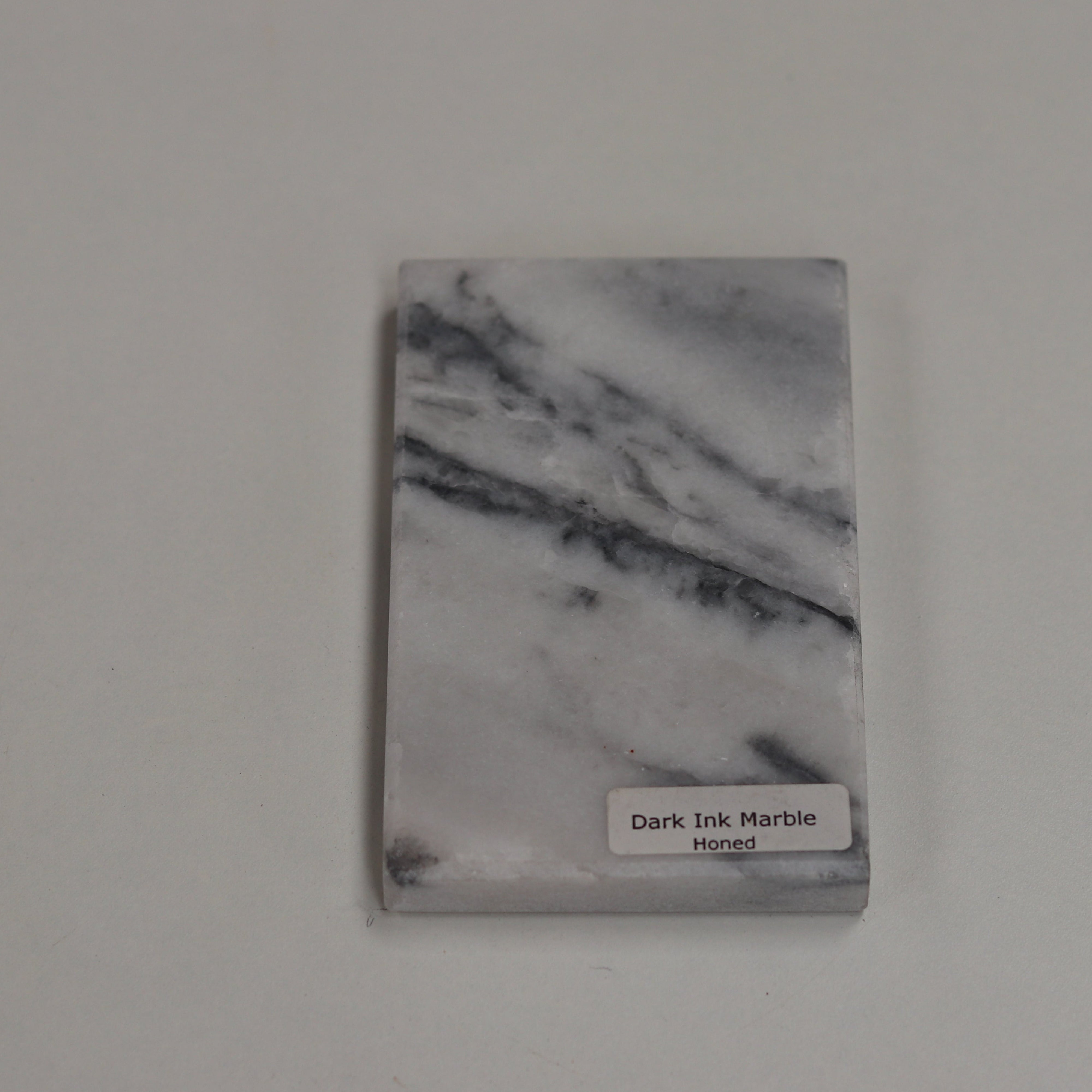 Honed Dark Ink — soft matte texture with subtle ink‑like veining